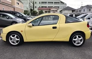 OPEL TIGRA 1997 YELLOW – BASEGRADE full