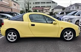 OPEL TIGRA 1997 YELLOW – BASEGRADE full